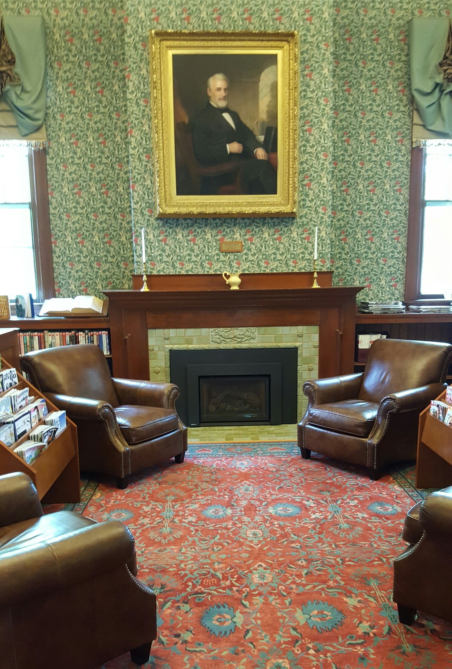 A portrait of Charles Flint hangs in the Library Reading Room
